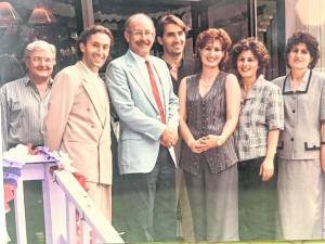 The opening of Trulli Alberobello (Momento II) Restaurant, 374 Morsetown Road, is celebrated in August 1996. Alberto Dautaj, owner, is first person on the left standing. Mayor Glenn Wenzel is next in line followed by Alberto’s wife Arta. With new owners the restaurant is now called Prime 374.