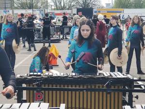 Indoor percussion groups include pit orchestra instruments, such as marimbas, vibraphones and drum sets, as well as marching band instruments.