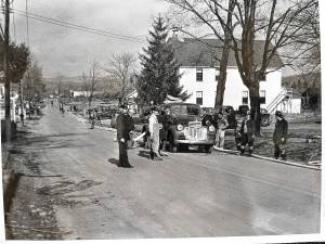 The West Milford Village building at 1468 Union Valley Road, built in 1930 to serve as Mechanics Hall, later became the first firehouse of West Milford Fire Company No. 1. The officer in this 1940s photo is John F. Moeller, father of John H. Moeller, who became the police chief. (Photo provided)