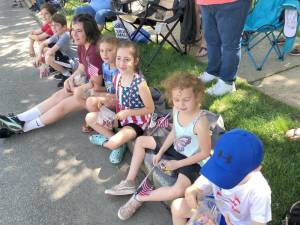 Children gather to watch the Memorial Day Parade in West Milford.