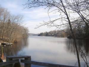 A location at Upper Greenwood Lake illustrates one of the many tranquil scenes residents of the community in the Township of West Milford see daily from their homes and other lakefront properties. With travel restrictions at a time of dangers of COVID-19 people are taking time to enjoy natural beauty from nearby. This place is near Greenwood Baptist Church. Photo by Ann Genader.