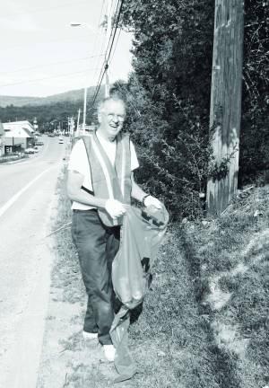 One of West Milford's volunteers picked up recyclables along Greenwood Lake Turnpike during Beautification Day.