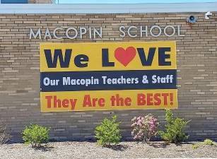 The Macopin Middle School PTO cannot contain its love for the Macopin teachers and staff. To celebrate National Teacher Appreciation Week, the Macopin PTO sponsored a 6-foot by 12-foot banner that is being hung on the exterior of the school to let the whole community know how much the children and parents of Macopin Middle School love and miss their educators during the COVID-19 isolation