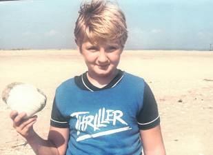 Frank Janitz, a student at Marshall Hill School in 1985, enjoys seashore exploring on a trip to Sandy Hook with his classmates. Photo Ann Genader