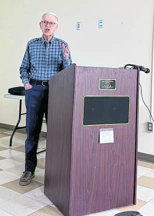 Joel Farkas speaks at the West Milford Library.