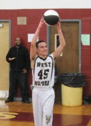 Photos courtesy of Luke Basket West Milford's Luke Basket holds up the ball commemorating his 1000th point.