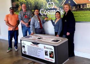 A donation bin for the West Milford Animal Shelter has been placed at Cosmo’s Fresh Market in Hewitt. From left are Joe Ardito and Paul Laycox, president of the West Milford Animal Shelter Society, with store manager Joffre Pesantes; Sandra Narvaes, vice president of operations; and Deirdre Wexler, community outreach coordinator at the supermarket. Donations of pet food, dog and cat toys and treats, cleaning supplies, and paper towels are welcome. (Photo provided)