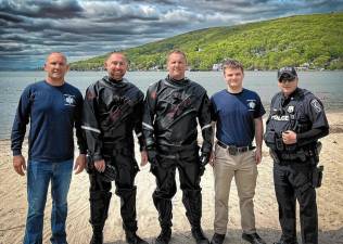 From left, Warwick Supervisor Jesse Dwyer, Sgt. Daniel Jones, Detective Jason Dwyer, Volunteer Ambulance Corps dispatcher Robert Foschini and Officer Patrick Duggan. (Photo courtesy of the Greenwood Lake PBA)