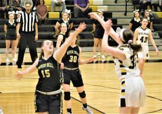 The Lady Highlanders against River Dell on Feb. 25.