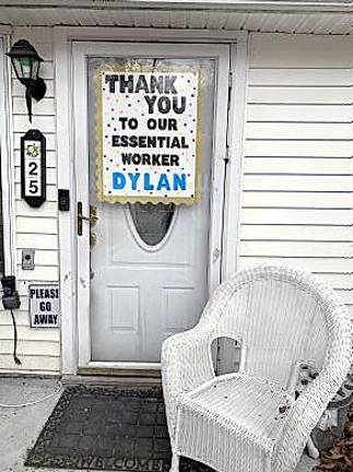 Kathy Schultz shared this photo of the sign she made and has hanging on her front door to support her son who works at the local ShopRite during this pandemic.