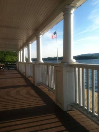 Photo by Don Webb The Awosting Boat House was a perfect spot to appreciate the stars and strips on Flag Day.