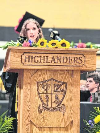 Salutatorian Anna Youngren speaks.