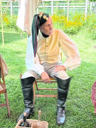Larry Young as a French enactor who escaped to Great Britain to avoid Madam Guillotine.