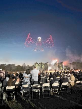 Drones form an American eagle in the sky. (Photo by Denise von Wilke)