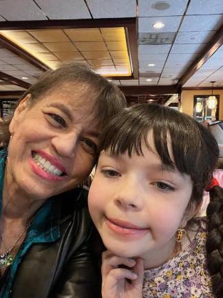 Lisa Johnson, of Middletown, with a granddaughter who was born methadone-addicted. Johnson took in four of her late son’s seven children over the years.