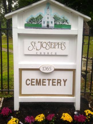 Brian Nilssen's Eagle Scout project included a new cemetery sign for St. Joseph's.