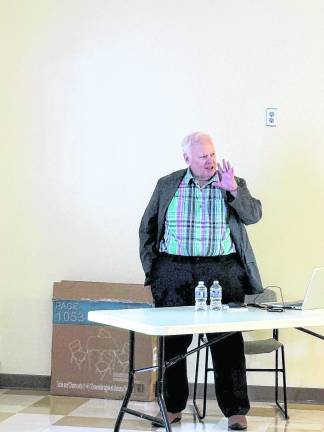 Kerry O’Brien speaks at the West Milford Library on June 30.