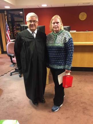 Submitted photos West Milford resident Denise von Wilke stands with Judge Imre Karaszegi, Jr., after becoming a sworn Court Appointed Special Advocate volunteer on Nov. 26 at the Passaic County Courthouse in Paterson.