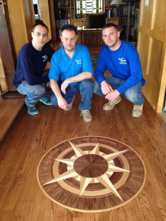 From left are Daniel, Bill, and Ryan Powell of Powell Flooring.