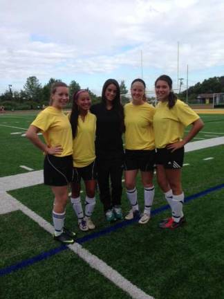 The West Milford soccer captains are, from left, Chelsea Gruber, Leisha Noble, Coach Natalie Buongiorno, Victoria Torp and Jacy DiZenzo.