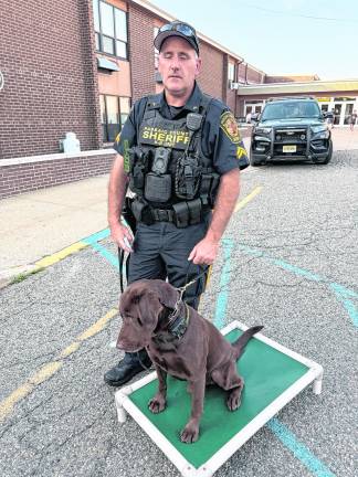 K9 Bosco, 8, and handler, Cpl. Testino from Passaic County Sheriff’s Office.