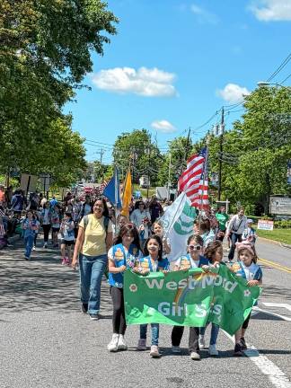 Girl Scouts march in the parade. (Photo by Denise von Wilke)