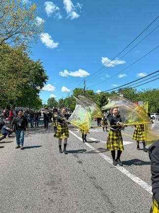 The West Milford High School marching band and color guard take part in the parade. (Photo by Denise von Wilke)