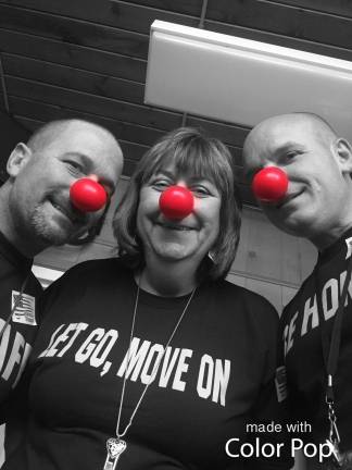 L to R: Asst. Principal Marc Citro, Principal Mary Reinhold, Asst. Principal Matt Strianse