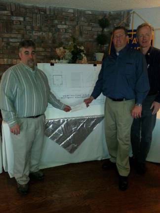Rotary helps with the girls' softball shed