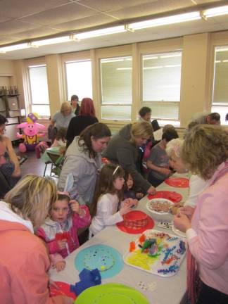 Kids participated in crafts at the spring celebration, held on Saturday.