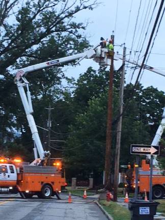 Chris Olert shared this photo of O&amp;R crews restoring electricity to 120 Warwick residents Tuesday night at Oakland Avenue and Third Street after a violent storm swept through southern edge of Warwick Village. Restoration to all took 14 hours