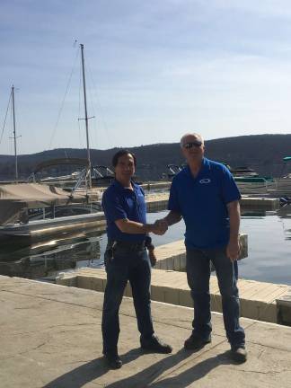 Drew Anoll and owner Christopher Leahy are planning big things for Sportsman's Marina in Hewitt.