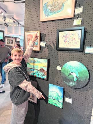 Nate Karpowicz won first place in the 12-and-youngerage group for What Lies Beneath (below) and Contained Castrope (above).
