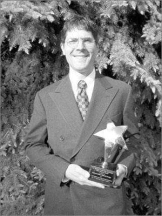 West Milford man wins award for communications program