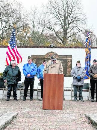 Glenn Wenz, former West Milford mayor and judge, speaks at the ceremony.