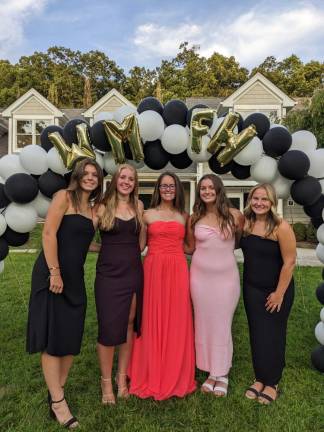 FH1 West Milford High School field hockey team captains gather for an opening dinner with members of the varsity, junior varsity and freshman teams Aug. 30 at a local lodge. (Photo provided)