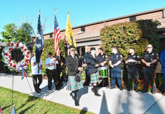 <b>Bagpipe and drum players followed by an honor guard march into the 9/11 Remembrance Ceremony on Thursday, Sept. 11 in Vernon. (Photos by Maria Kovic)</b>