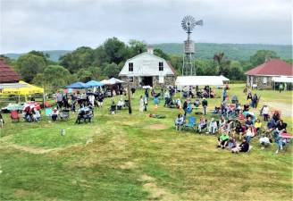 Hundreds gathered at the Wallisch Homestead last summer for a music festival.