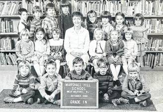 In the mid-1980s when the West Milford Board of Education was looking to close a school, taxpayers throughout the district saw a need for property tax figures reduction. Students in Alice Neal’s Marshall Hill School 1980 first grade are pictured with their teacher. Standing: Hillary Cameron, Jennifer Hochstadler, Johanna Berry, Melissa Larselle, Scott Rifflard, Robert Laggan, Terry Kitchell, Albert Alfieri; Sitting: Beth-Ann Milne, Lisa Hanson, Lisa Mattson, Mrs. Neil, Betty Steiner, Becky Andrews, Amanda Earl; front row: Steven Holley, Kenneth Nord, James Gearl, Christopher Dolan, Matthew Goudey.