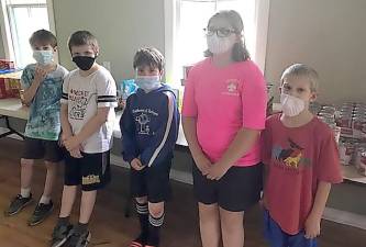 Pictured from left to right are scouts D. Rowe, C. Trusz, J. Rowe, L. Bobrowski and B. Bobrowski. The boys are with pack 159 and L. Bobrowski is with Troop 44. Photos by Wayne Rowe.