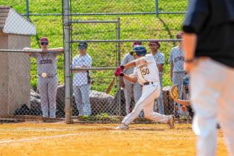 Senior Chris Martinez swings at a pitch during the game against Mahwah on May 2. The Highlanders won, 12-2. (Photos by TJ Nolan)