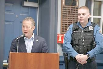 Rep. Josh Gottheimer, D-5, speaks Wednesday, Jan. 18 in West Milford. At right is township Police Officer Michael Weber. (Photos provided)