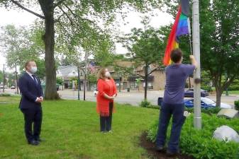U.S. Rep. Josh Gottheimer and Oradell Mayor Dianne Didio watch as an LGBTQ Pride Flag is raised during ceremonies on June 5 in Oradell. Provided photo.