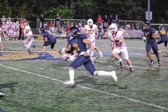 Jefferson ball carrier Braedan Cummings on the run in the game against Whippany Park at home Friday, Sept. 26. Jefferson won, 48-26, and Cummings made one touchdown. (Photos by George Leroy Hunter)