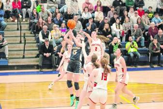 Jefferson's Kiley Shatzel (15) leaps toward the hoop in the game against Glen Rock on Friday, March 1. The Falcons won, 52-31, to take the NJSIAA North Jersey, Section 1, Group 2 championship at home. (Photos by George Leroy Hunter)