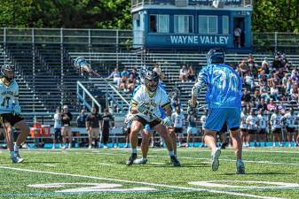 The West Milford High School boys lacrosse team falls to Wayne Valley, 10-8, in the Passaic County Tournament final Saturday, May 10. (Photos by Jack Lizza)
