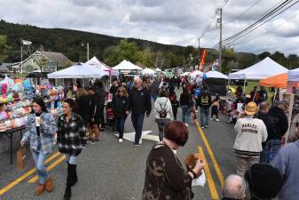 People stroll along Union Valley Road during the 27th annual Autumn Lights Festival in West Milford. (Photo by Rich Adamonis)