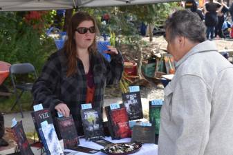 West Milford author Holley Cornetto sells her books at the recent Autumn Lights Festival. (Photo by Rich Adamonis)
