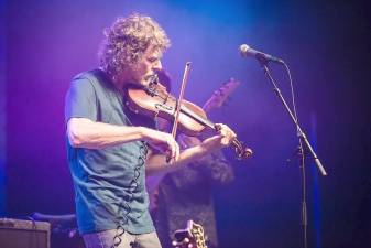 Sam Bush plays some foot-tapping bluegrass.