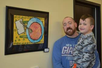 Connor Babcock with his father, Jesse.